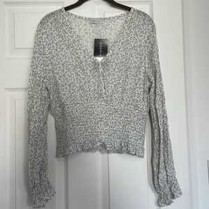 Lightweight blue and white blouse